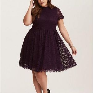 Purple torrid dress with lace shoulder detail.